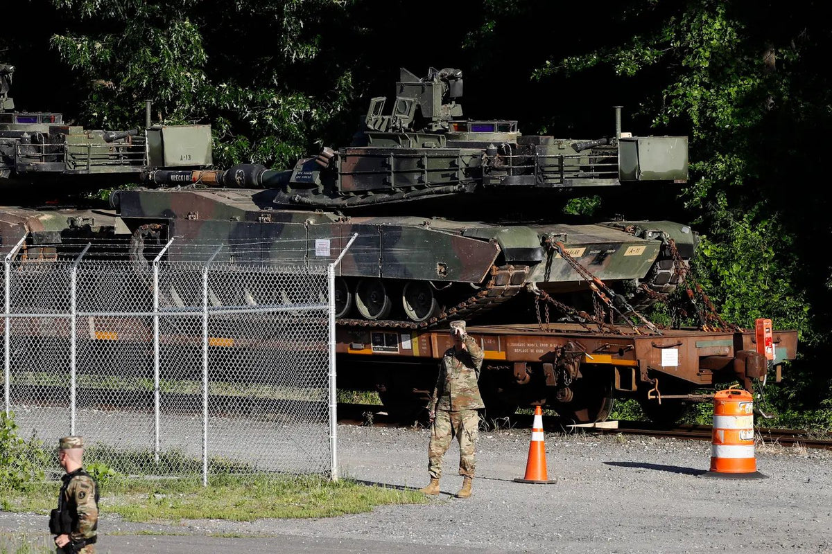 M1A1 Abrams tanks secured to railroad flatcars ahead of President Donald Trump's 2019 "Salute to America" Fourth of July celebration in Washington, D.C.