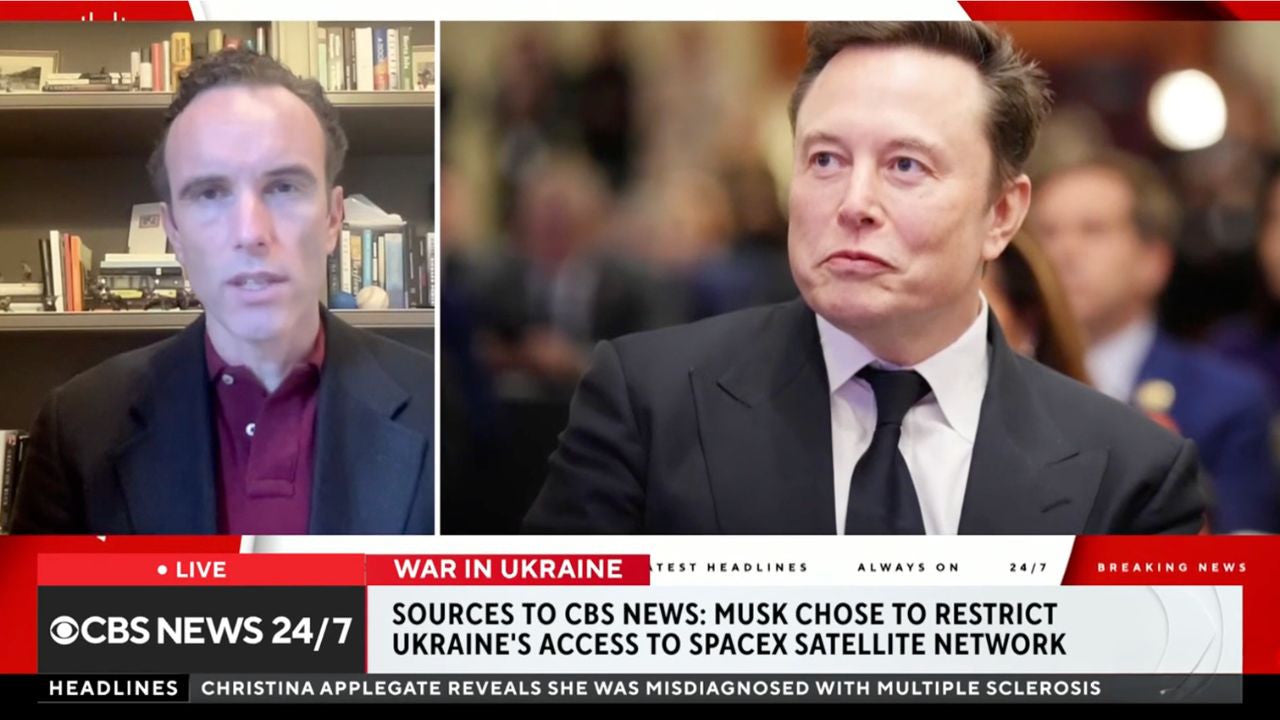 CBS News split-screen showing Elliot Ackerman beside a photograph of Elon Musk during a segment on Ukraine’s Starlink access.