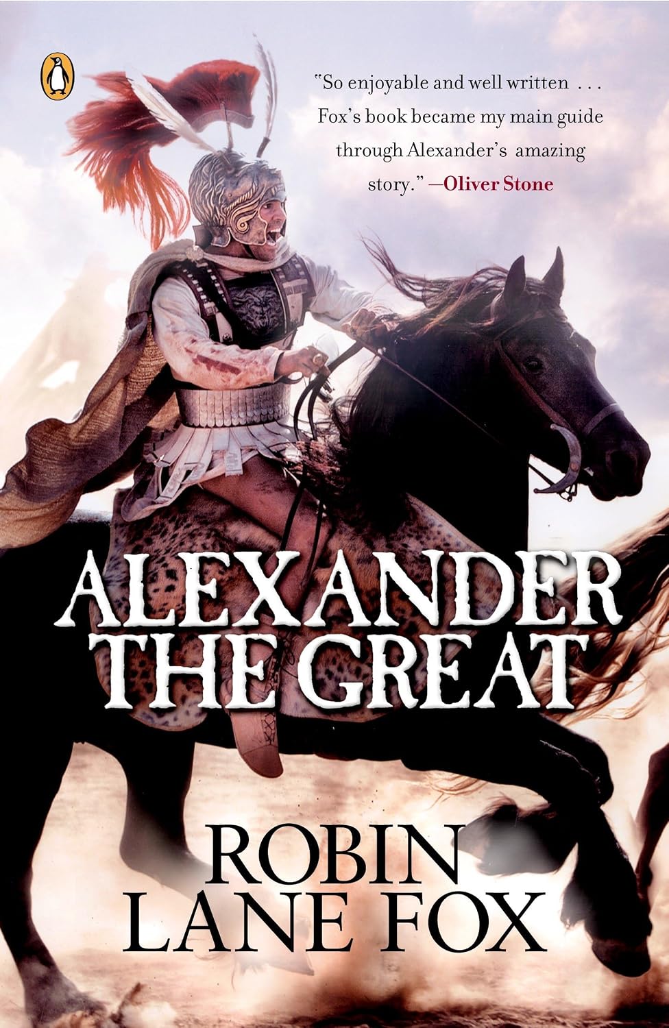 Book cover for Alexander the Great by Robin Lane Fox, featuring an armored Macedonian warrior riding a black horse beneath a cloudy sky. The Penguin logo appears at the upper left, with a recommendation from Oliver Stone above the large white title and the author’s name at the bottom.